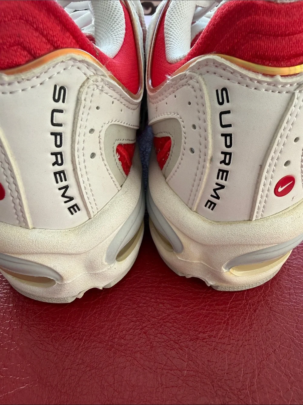 White and Red Nike x Supreme Sneakers